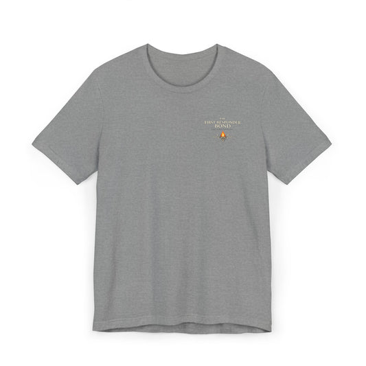 First Responder Bond T-ShirtTHE FIRST RESPONDER BOND They don’t call it family. But it feels like one. It’s formed in sirens and silence, in blood on gloves and eyes that say, I’ve got you. It’s...