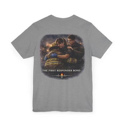 First Responder Bond T-ShirtTHE FIRST RESPONDER BOND  They don’t call it family. But it feels like one.  It’s formed in sirens and silence, in blood on gloves and eyes that say, I’ve got you. It’s...