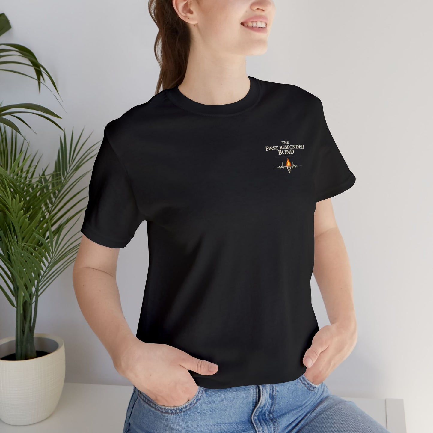 First Responder Bond T-ShirtTHE FIRST RESPONDER BOND  They don’t call it family. But it feels like one.  It’s formed in sirens and silence, in blood on gloves and eyes that say, I’ve got you. It’s...